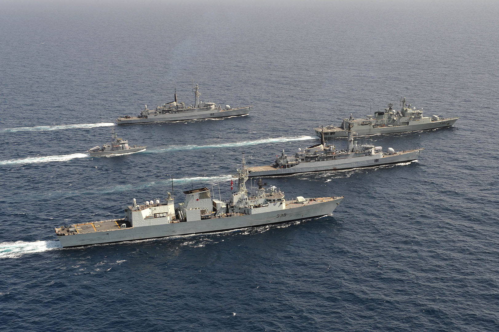 IS2009-6638 28 April 2009 Indian Ocean  Her Majesty's Canadian Ship (HMCS) Winnipeg (forefront), Standing NATO Maritime Group 1 (SNMG1) and Pakistani Navy maneuver for a photo opportunity together in the Indian Ocean at the conclusion of a two-day joint naval exercise.   HMCS Winnipeg is operating in the Gulf of Aden under Standing NATO Maritime Group 1 (SNMG1) to counter acts of piracy and provide security for transiting merchant vessels. Commanded by Commander Craig Baines, the Halifax-class patrol frigate has a crew of approximately 240, including a CH-124 Sea King helicopter detachment.  Canada's participation in SNMG1, conducted under Operation SEXTANT, represents a continuing commitment to international peace and security. HMCS Winnipeg is the 5th Canadian Ship to deploy since 2006 to join SNMG1, which represents a multi-national maritime force capable of conducting missions across a broad spectrum of operations anywhere around the world.  Photo: Warrant Officer Carole Morissette, Canadian Forces Combat Camera 