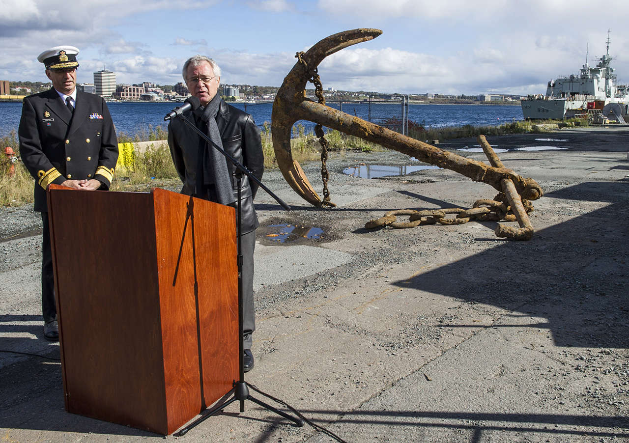 Director of the Naval Museum of Halifax, Richard Sanderson (right) and Rear-Admiral (RAdm) John F. Newton, Commander Joint Task Force Atlantic (JTFA) and Maritime Force Atlantic (MARLANT) (left) make a media announcement on the anchor that was found during the demolition of building D19, Canadian Forces Base (CFB) Halifax.
