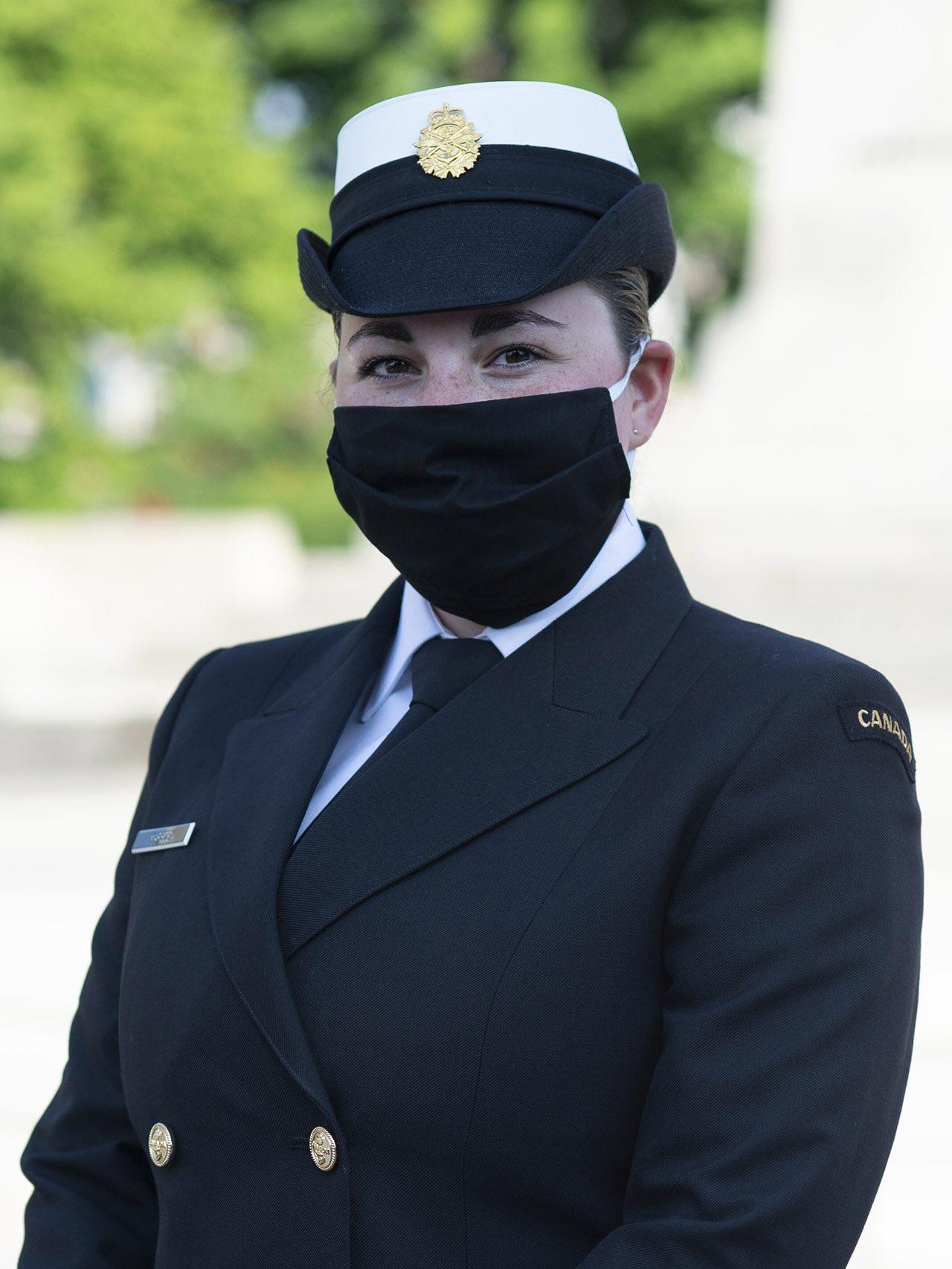 OS Erin Marsden standing for a photo wearing the mask National Sentry participants will be wearing to help prevent the spread of COVID-19.