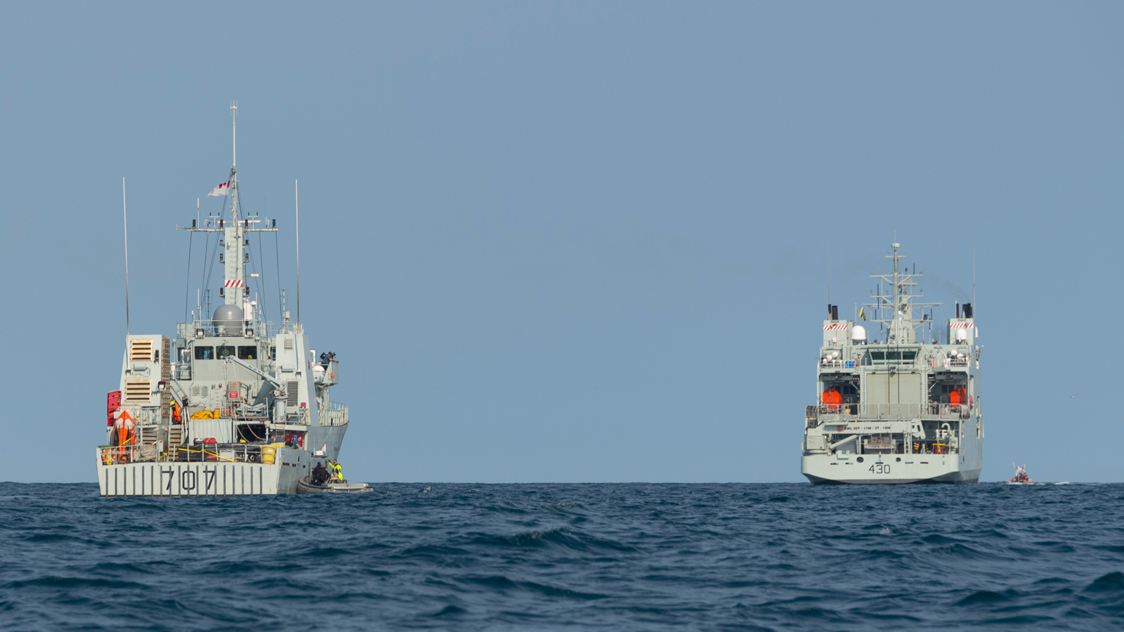 HMC Ships Goose Bay, left, and Harry DeWolf conduct boat work exercises during Op Nanook.